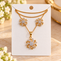 Writing      Gold Plated Floral Necklace and Earrings Set for Women & Girls | Elegant Flower Pendant Jewellery Set with Matching Earrings | Sparkling Party Wear, Wedding, Festive Wear & Gift